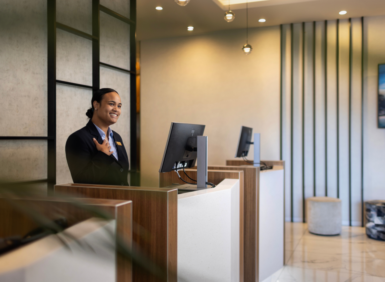 Meet - The Sebel Auckland - Banner 3 Receptionist at desk