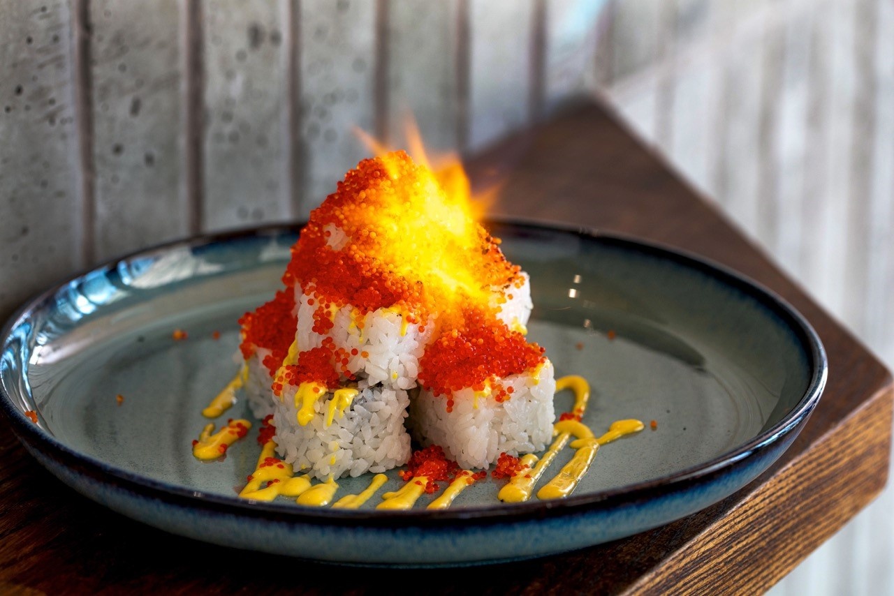 Sushi on a plate with flame