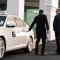 Corporate Cabs picking up a customer